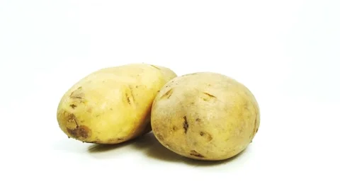 Close-up gold potato rotating Stock Footage 218959410