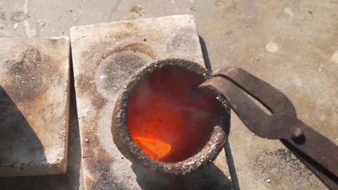 Close up of gold refinement and melting at workshop Video stock 336616454