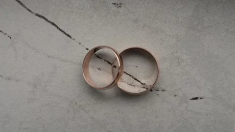 Close-up of gold wedding rings Stock Footage 314525339