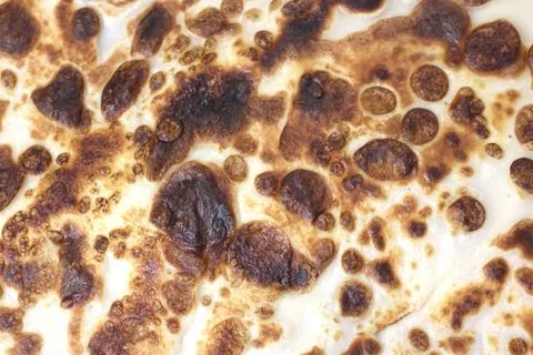Close-Up of Golden-Brown Bread Crust Texture for Culinary Design Foto stock