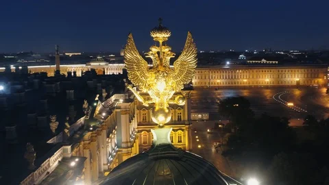 Close golden double-headed epic eagle Winter Palace Hermitage Petersburg Aerial Stock Footage 129926052