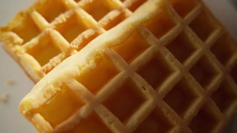 Close-up of Golden Waffles with Crispy Texture Stock Footage 296159320