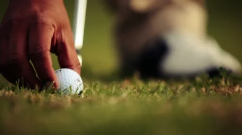 Close up of a golf ball being played Stock Footage