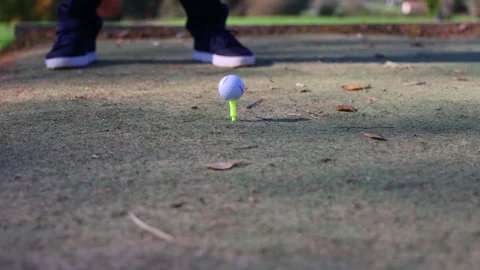 Close-up of a golf ball being struck from the tee at the start of a tournamen Stock Footage 292017428