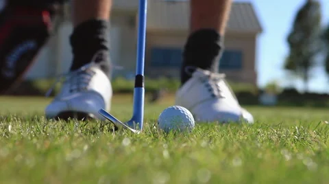 Close up of golf ball getting hit at golf club Stock Footage 54669196