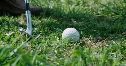 Close up golf ball hit slow motion Stock Footage 94344182