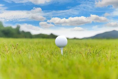 Close up of Golf ball on tee on golf course Stock Photos