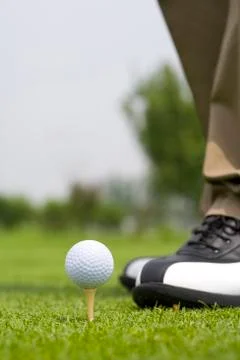 Close-up of golf ball on tee Stock Photos