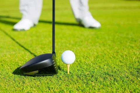 Close up of golf ball on tee 스톡 사진