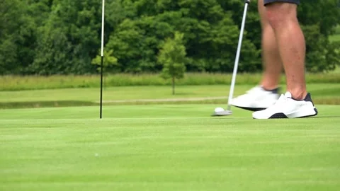 Close Up of a Golfer Putting a Ball on the Green Video stock 337637935