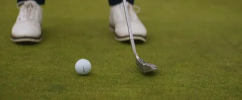 Close Up of Golfer Putting on Green Stock Footage 242379229