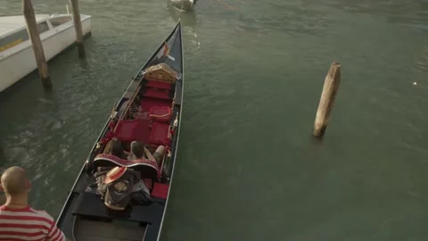 Close-up of Gondola Going Through Bridge in Venice, Italy Stock Footage 148628326