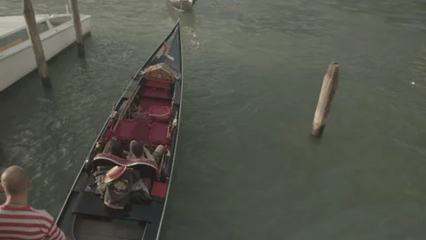 Close-up of Gondola Going Through Bridge in Venice, Italy Stock Footage 148695320
