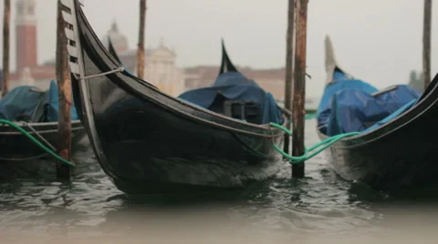 Close-up gondolas sway on the waves in Venice Stock Footage 47695986