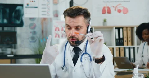 Close up of good-looking confident modern qualified adult bearded medical Stock Footage 159828023