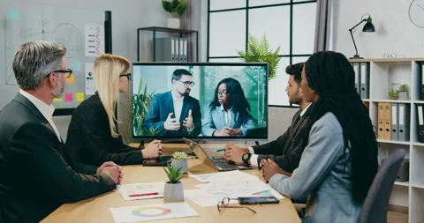 Close up of good-looking confident qualified multiracial businesspeople which Vidéo 161020265