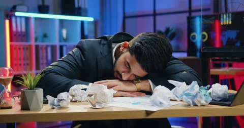 Close up of good-looking fatigued overworked bearded businessman which sleeping Stock Footage 166727538