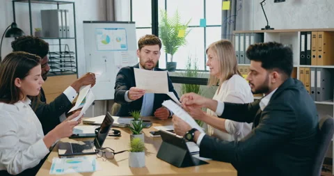 Close up of good-looking hardworking confident smart diverse team which working Video stock 159583930