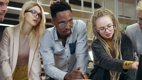 Close up of good-looking high-spirited smart modern international team which Stock Footage 133645688