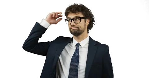 Close up of the good looking man in the glasses, suit and tie standing in front Video stock 104284678
