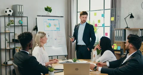 Close up of good-looking skilled bearded businessman which standing near Stock Footage 159660969