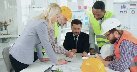 Close up of good-looking skilled professional multiracial specialists-engineers Stock Footage 145610783