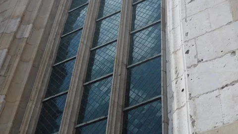 Close-Up of Gothic Stained Glass Window on a Historic Cathedral Stock Footage 307561816