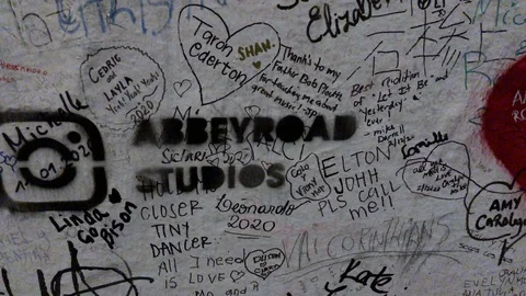 Close up of graffiti at Abbey road Studios and their Instagram Stock Footage 128388144