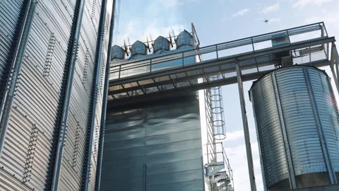 Close-up of grain silos with ladders and catwalk. Video stock 320115813