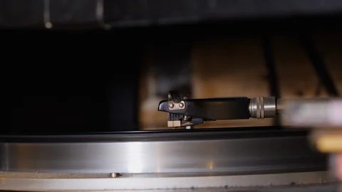 Close up of gramophone placed on table playing vinyl record at Jazz Bar Stock Footage 146150219