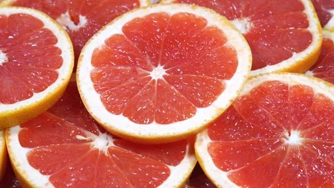 Close Up grapefruit Slices Backgroung Video stock 97292609