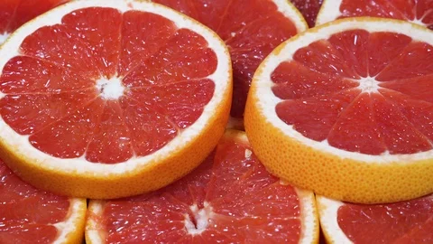 Close Up grapefruit Slices Backgroung Video stock 97292770