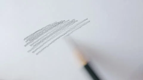 Close up of graphite pencil drawing on textured paper. slow motion footage Stock Footage 340910126