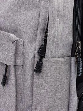 Close up of gray backpack pocket and zipper Stock Photos