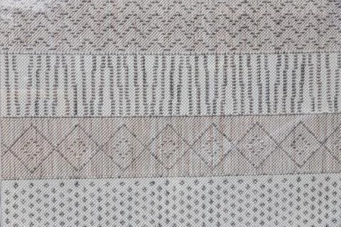 Close-up gray-beige patterned fabric Stock Photos