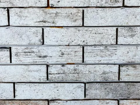 Close-up, Gray brick wall with texture brick. Contrast stitches Stock Photos