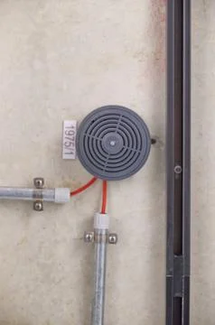 Close-Up of Gray Circular Device with Wires Stock Photos