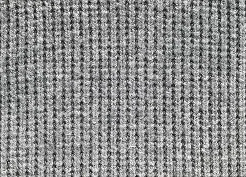 A close up of a gray fabric with a pattern of lines 库存照片