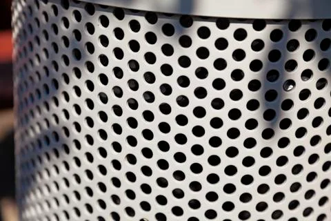 Close up of gray garbage basket in Roback, exciting circle pattern Stock Photos