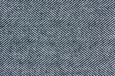 Close-Up of a gray herringbone fabric pattern for background pur Stock Photos