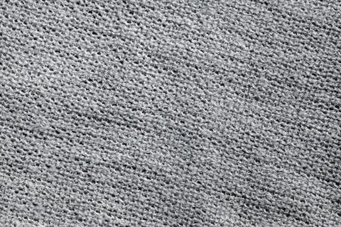 Close up of gray knitted wool texture. Фото