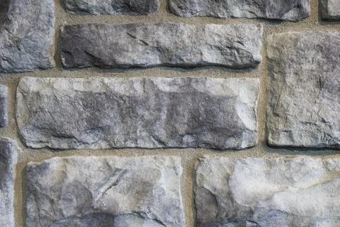 Close-Up of Gray Limestone Wall Texture with Rectangular Natural Stone Patter Stock Photos