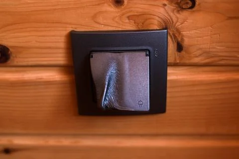 Close-up of gray socket burned melted electrical short circuit Stock Photos