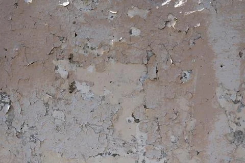 Close-up - gray stone wall in the old facade of the house Stock Photos