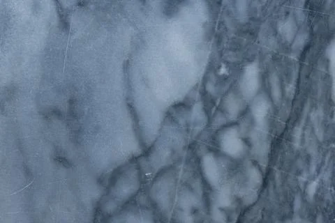 Close-up - gray stone wall in the old facade of the house Stock Photos