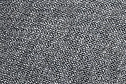 A close-up of a gray wicker surface as a wallpaper texture Stock Photos