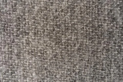 Close-Up Gray Wool Fabric Texture Macro Shot Showing Woven Fibers and Cozy .. Stock Photos