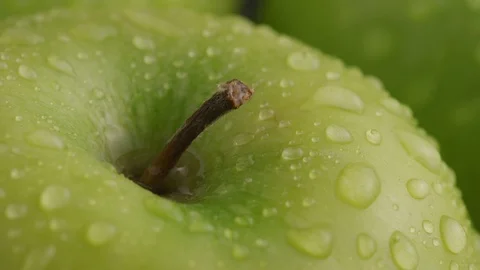 Close-up of green apple with water droplets Stock Footage