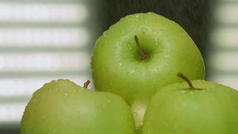 Close up of green apples in the rain Stock Footage 73417438