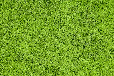 Close up Green artificial grass textures background Stock Photos